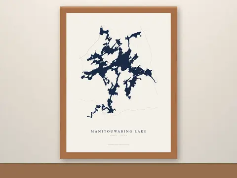 Framed Manitouwabing Lake Map in a red oak frame